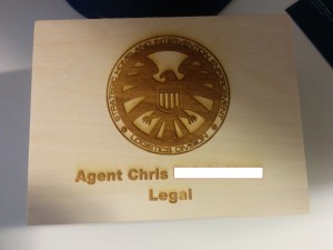 Front, Laser Engraved with his name and position.